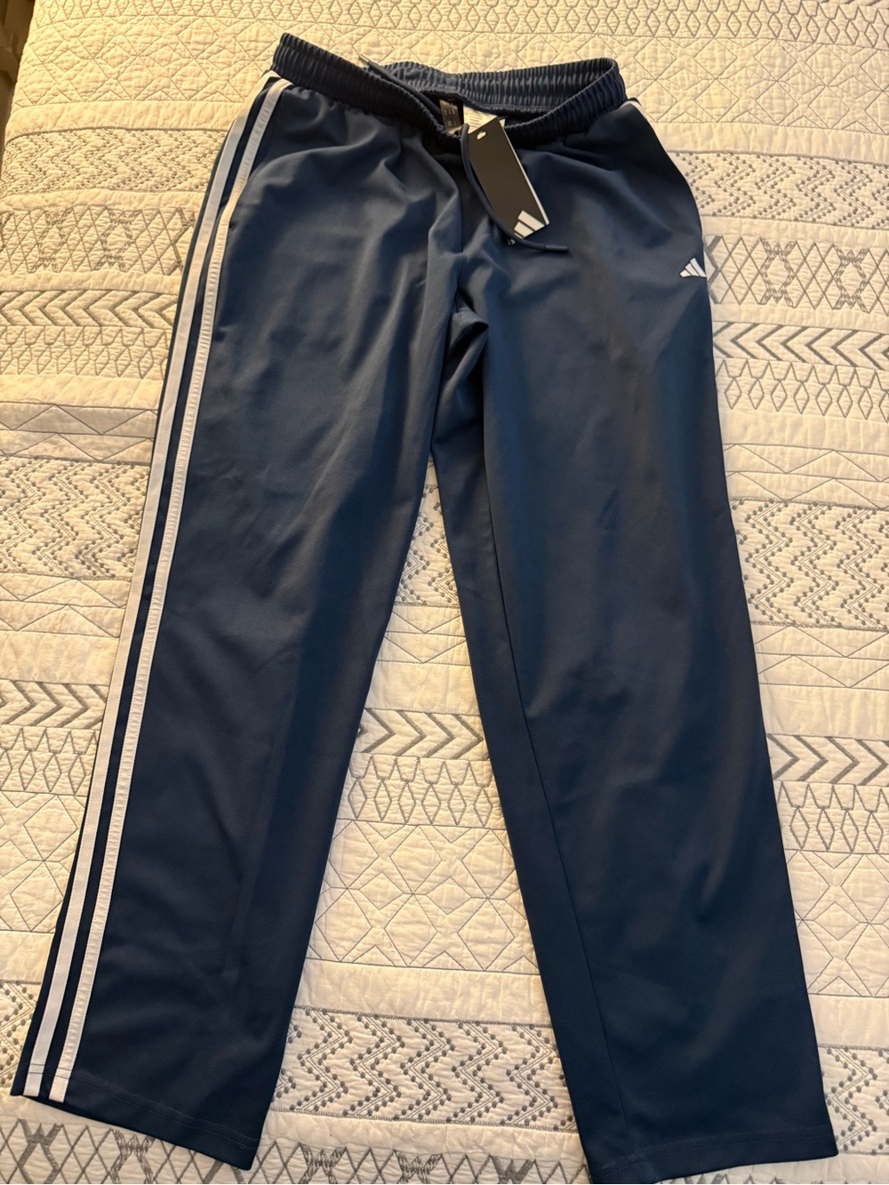 Adidas men’s navy Track Pants with White Stripe. Medium